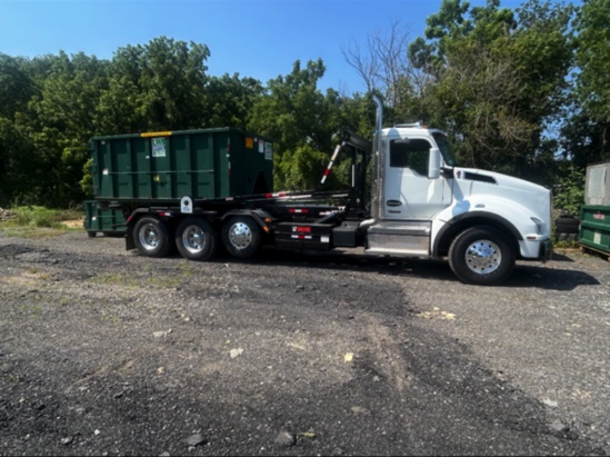 WRS dumpster delivery truck serving Middletown, DE